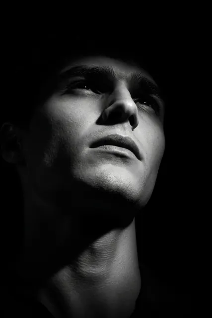 Dramatic Low-Angle Monochrome Silhouette Portrait