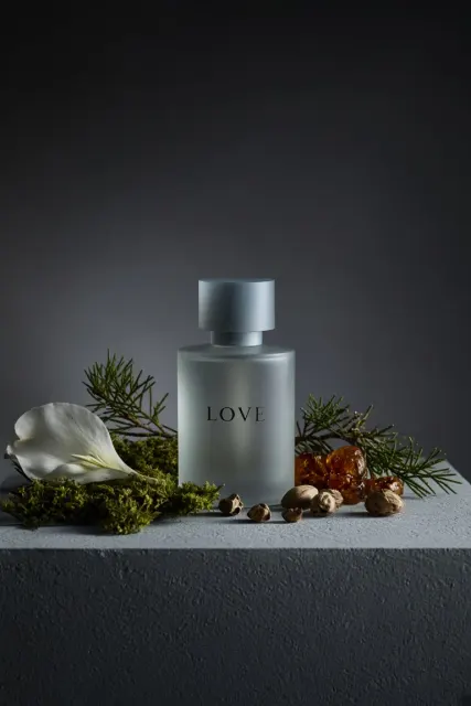 Wide Angle image example: Minimalist Matte Perfume Bottle Still Life Photography