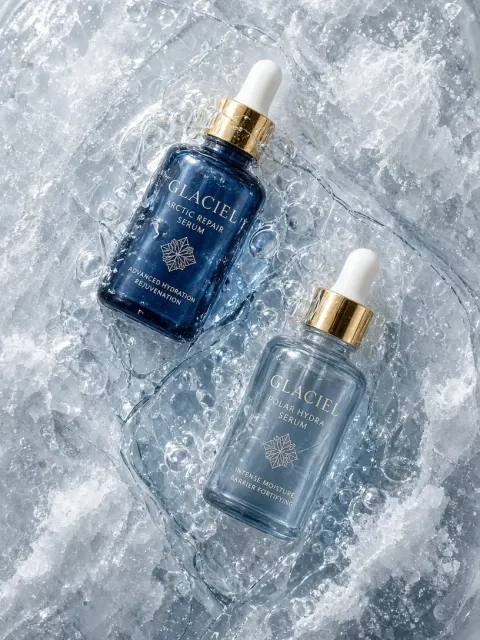 Skincare Serums Under Fractured Ice Macro