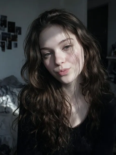 Moody Ambiance image example: Playful Girl Snapshot in Dim Room on CCD Camera