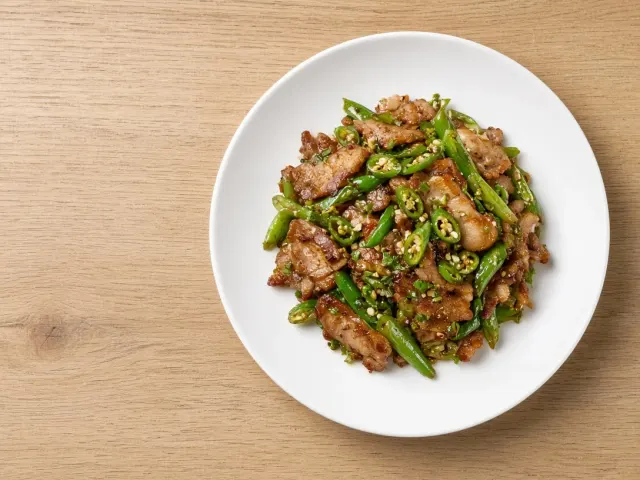 PPT Template image example: Overhead Commercial Stir-Fried Pork Culinary Flat-Lay