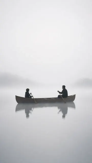 Minimalist Canoe on a Misty Morning Lake