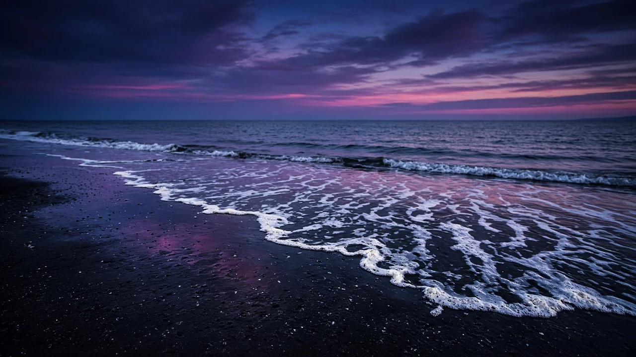 Twilight Tide Swirling over Obsidian Volcanic Sand