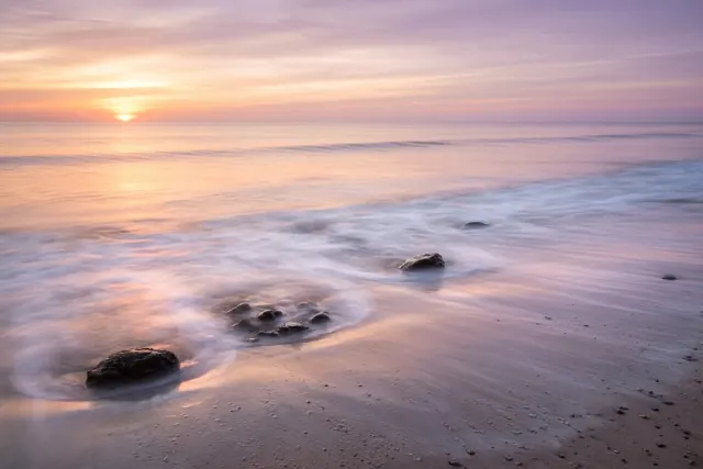 Silky Long Exposure of Pastel Swells at Sunset
