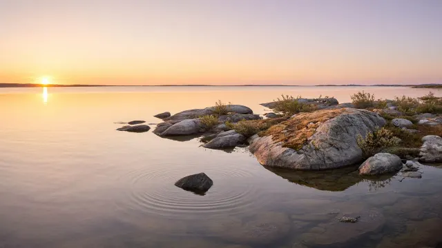 Midnight Sun Over a Subarctic Lapland Shield Lake