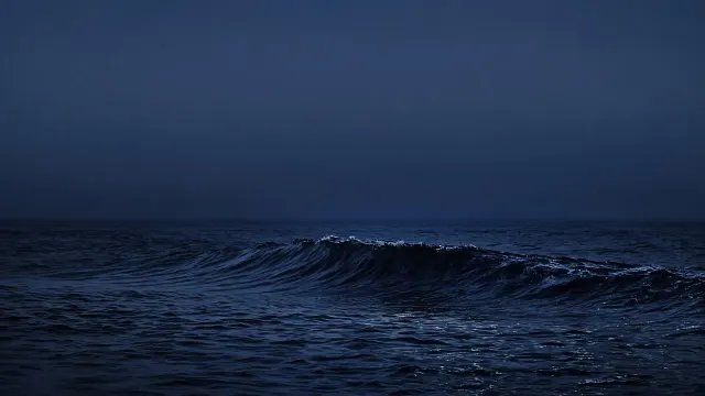 Moody Midnight Ocean Swell Beneath Starless Twilight