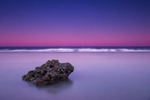 Twilight Long Exposure Over Sheltered Coral Caye Lagoon and Outer Breakers
