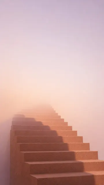 Minimalist Terracotta Stairway Reaching into Peach Morning Mist