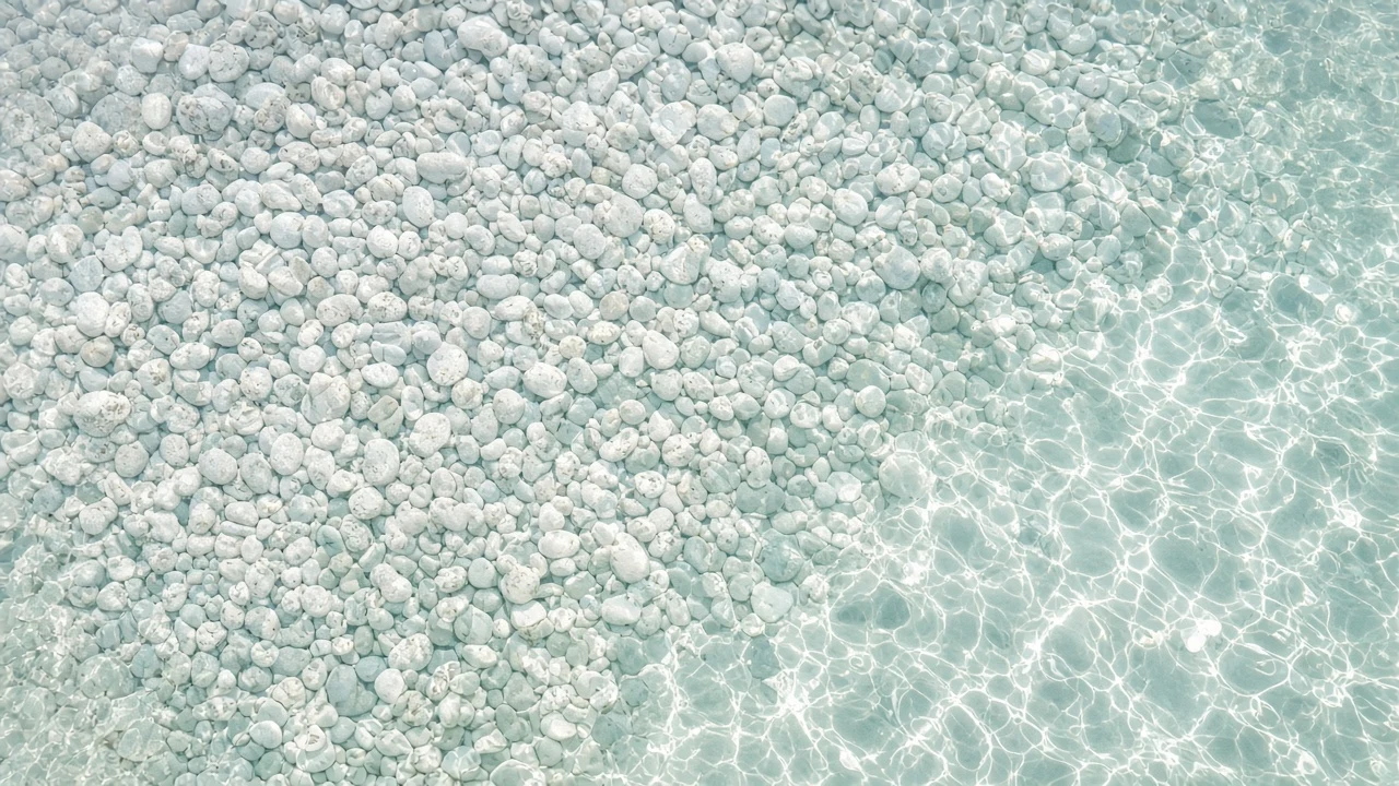 Shallow Clear Tide Pool over Smooth White Quartz Pebbles