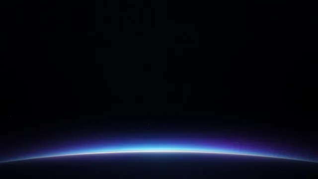 Midnight Celestial Void with Luminous Horizon Halo at Base