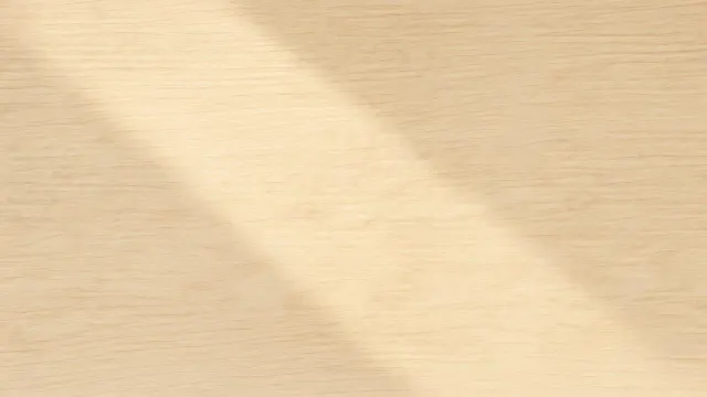 Scandinavian Blond Birch Plywood Grain with Soft Diagonal Sunbeam