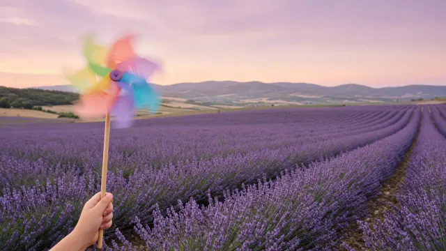 Whimsical Paper Pinwheel Spinning in Lavender Rows