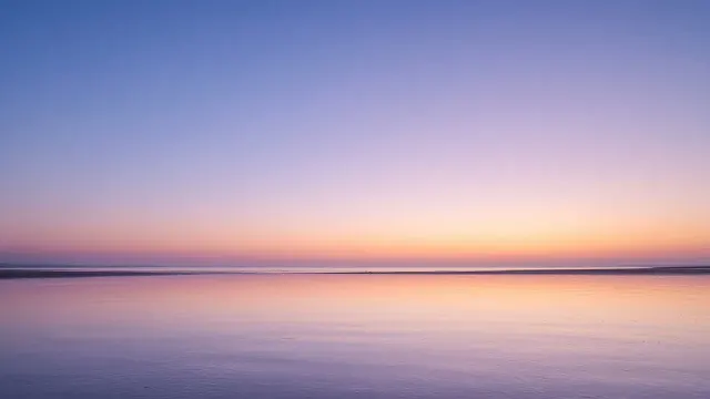 Calm Atlantic Tidal Flats with Subtle Water Rhythms