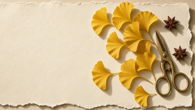 Minimalist Botanical Flat Lay of Pressed Ginkgo Leaves on Handmade Cotton Paper