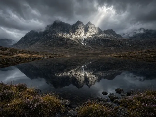 Loch Cuillin Moody Mist and Basalt Reflection in the Scottish Highlands