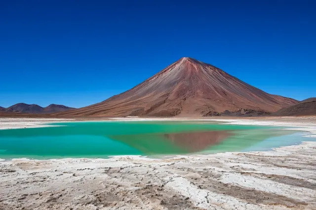 Atacama Altiplano Licancabur Volcano over Laguna Verde