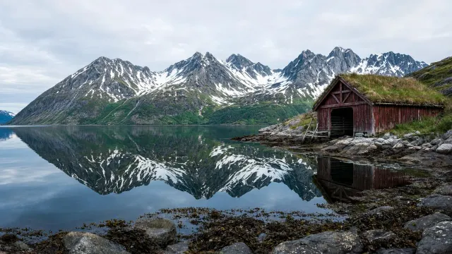 Sunnmøre Alps Fjord Tarn and Weathered Boat Shed