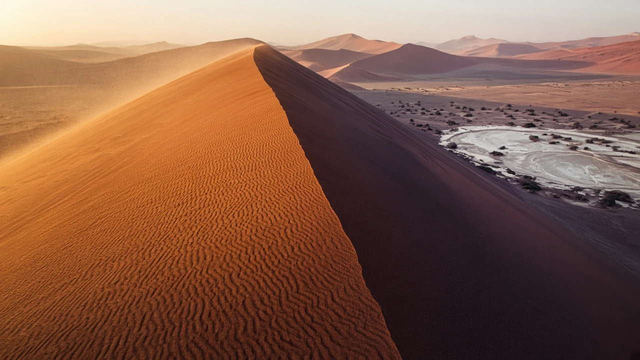 Namib Apricot Dunes with Chiaroscuro Ridge and Deep Violet Shadows