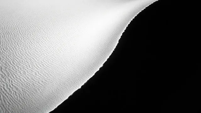 Chiaroscuro Black and White Monolith of a Singular Dune Crest