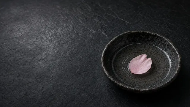 Wabi-Sabi Black Raku Ceramic and Floating Prunus Petal