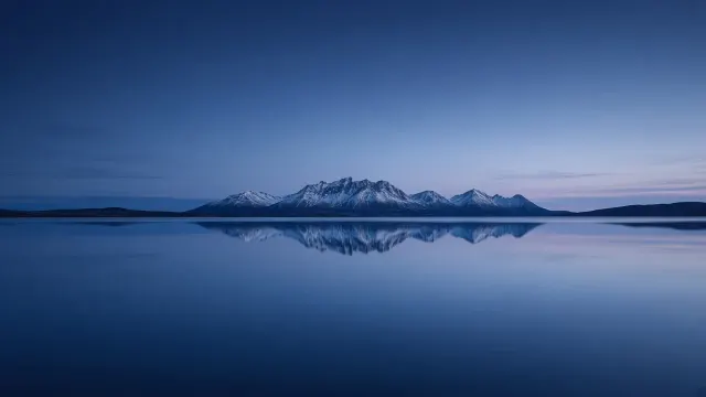 Still Waters of a Norwegian Fjord Under Arctic Blue Hour