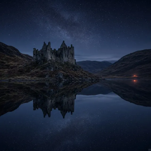 Highland Loch and Ruined Keep Under Starfall