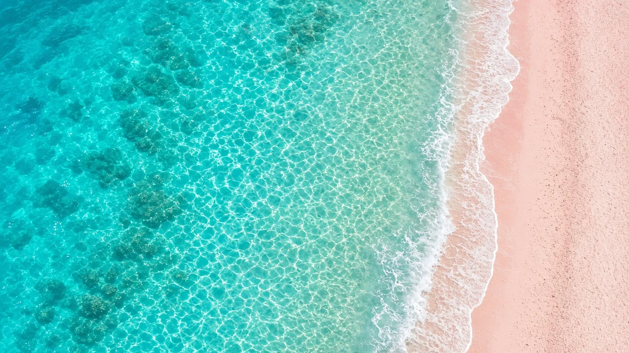 Aerial Coral Sand Shoreline with Crystalline Turquoise Water